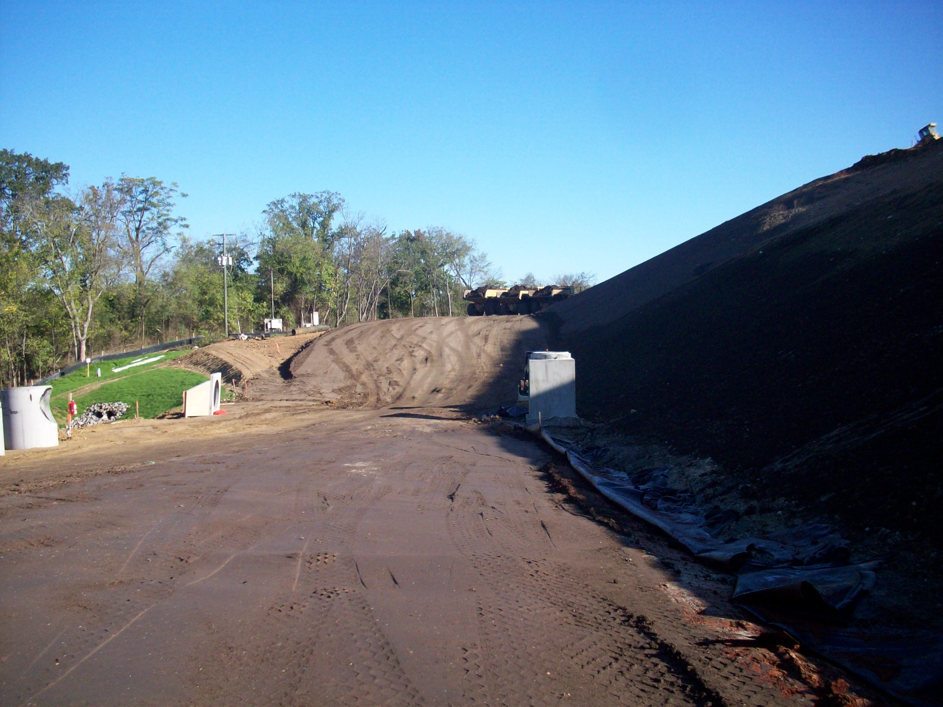 Geosynthetic reinforced slope with compacted fill material